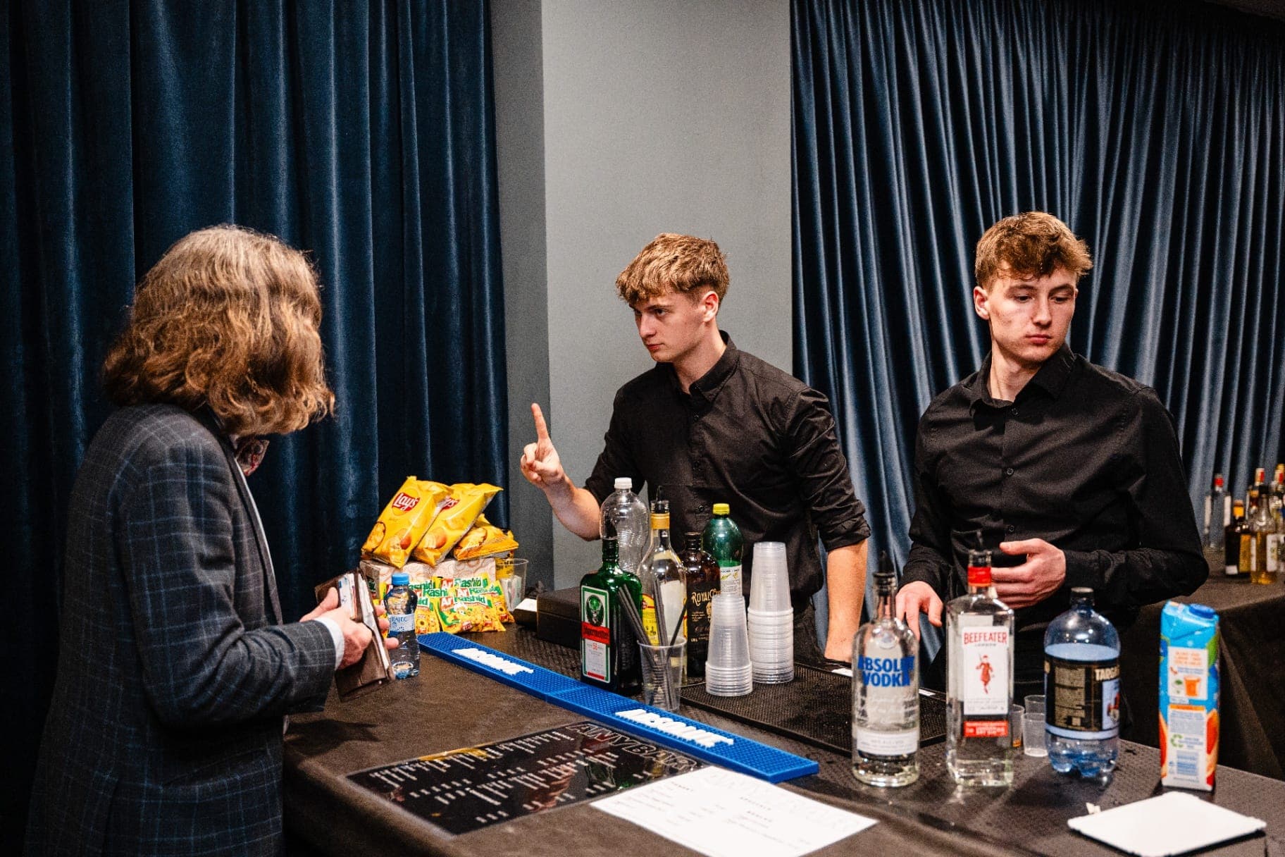 Bar staffed by Crewmate at a club event